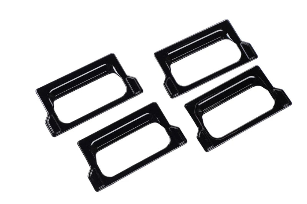 4 pcs of Black catch cover on a clear white background.