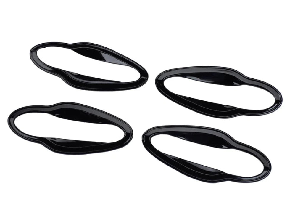 Set of 4 black catch covers for Nexon, displayed on a white background.