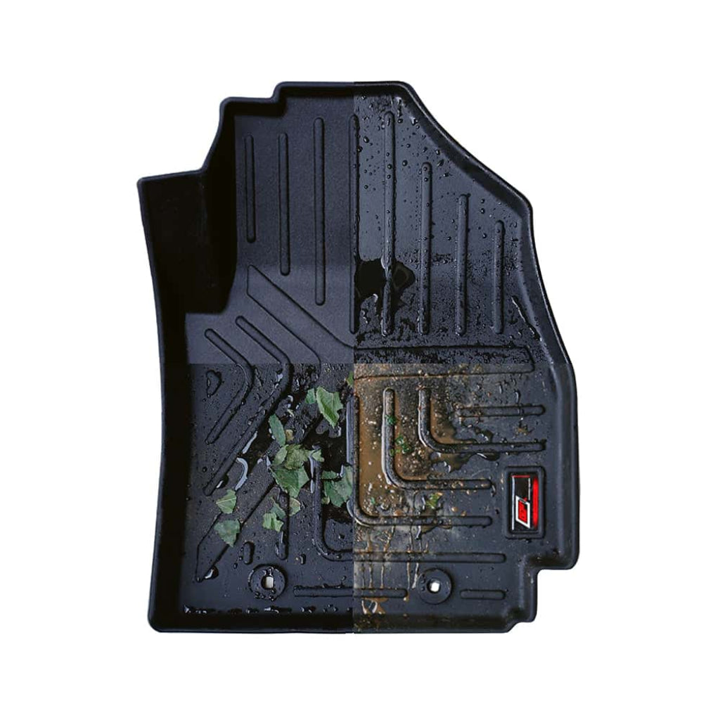 Black car floor mat with visible wear and dirt on a white background