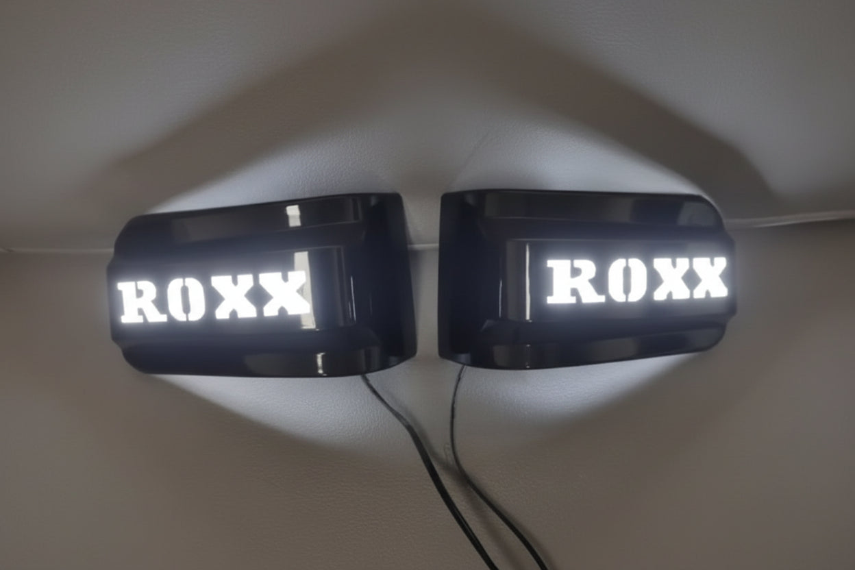 Two ROXX-branded lights on a white background