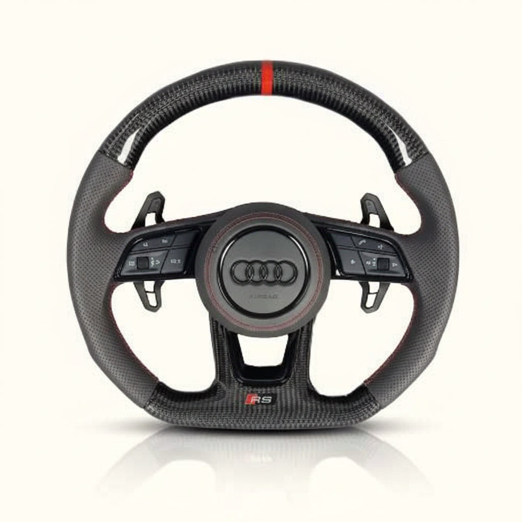 Carbon fiber steering wheel with Audi logo on a white background