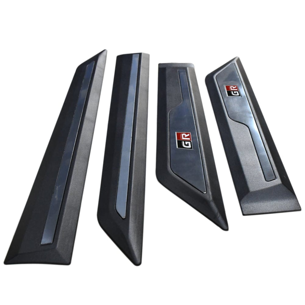 Four car door scladding with a logo on a white background