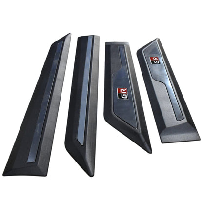 Four car door scladding with a logo on a white background