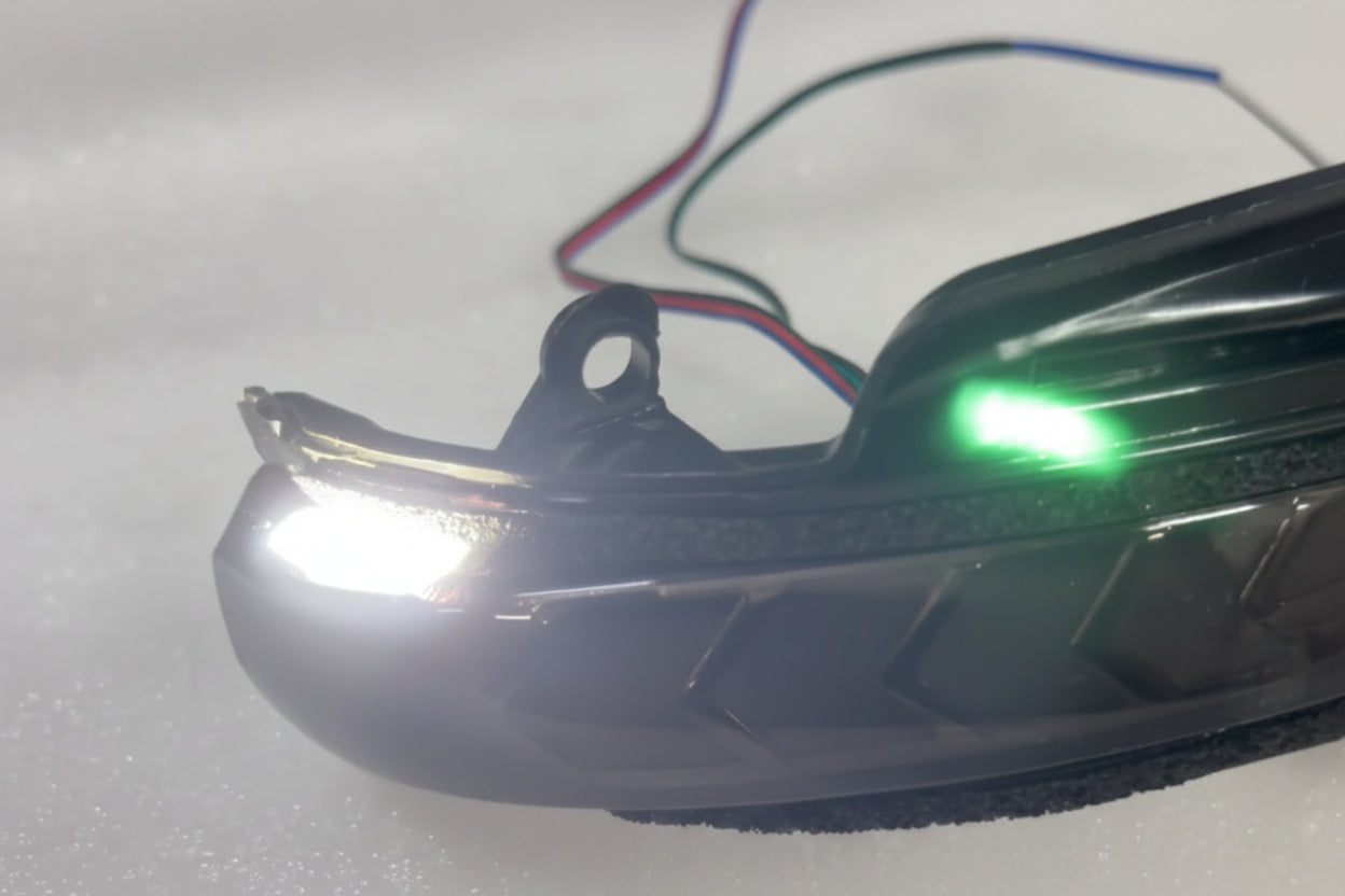 Close-up of a car indicator assembly on a white background