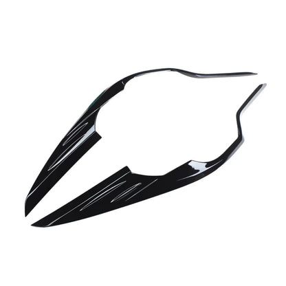 Set of 2 pcs black headlight cover for Fortuner, displayed on a white background. 