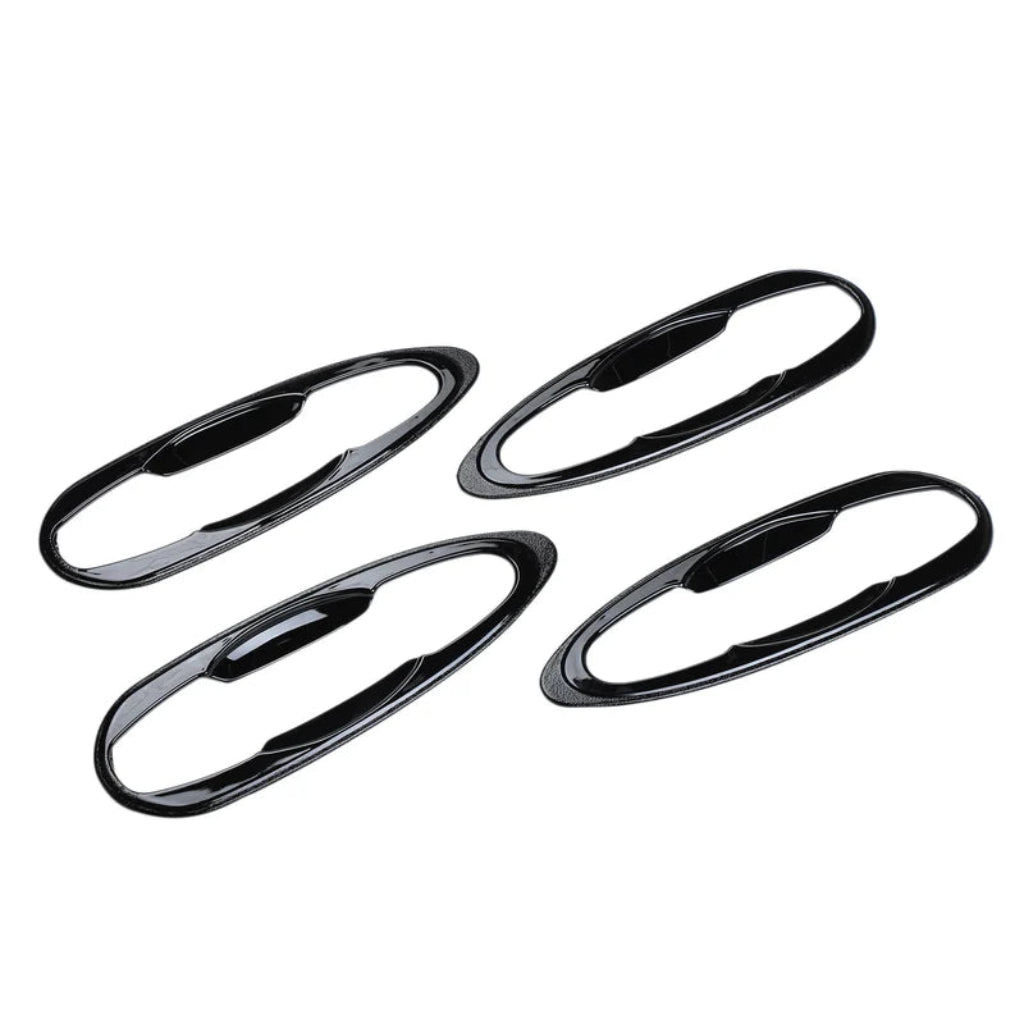Set of 4 pcs black catch covers for Fortuner, displayed on a white background. 