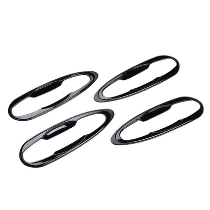 Set of 4 pcs black catch covers for Fortuner, displayed on a white background. 