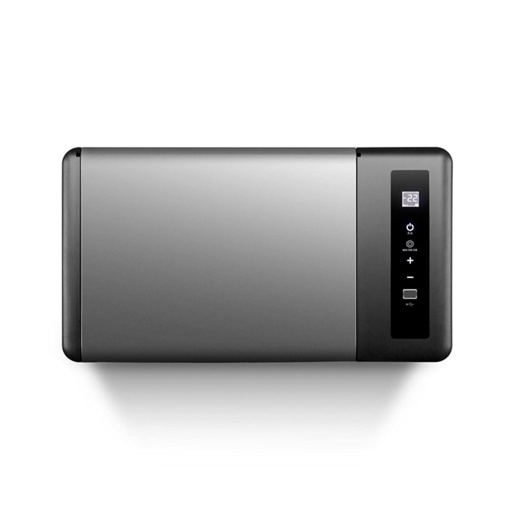 Black electronic device with control buttons on a white background