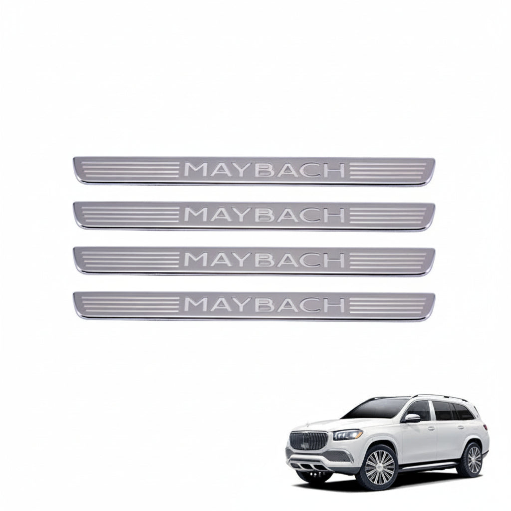 Set of Maybach door sill protectors on a white background with a white SUV.