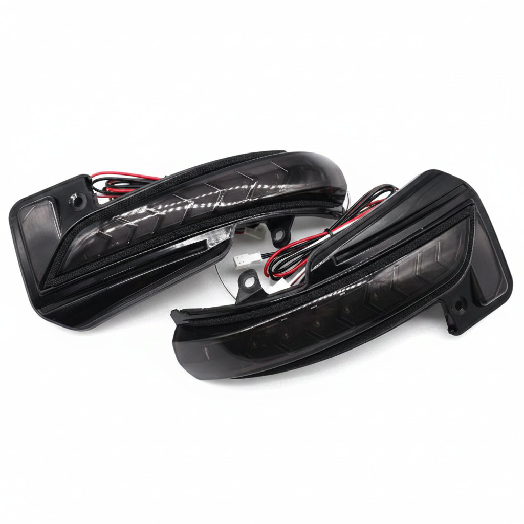 Two black car mirrors on a white background
