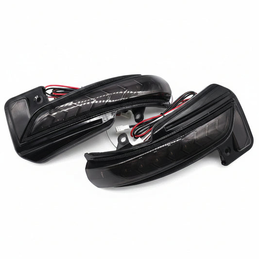 Two black car mirrors on a white background