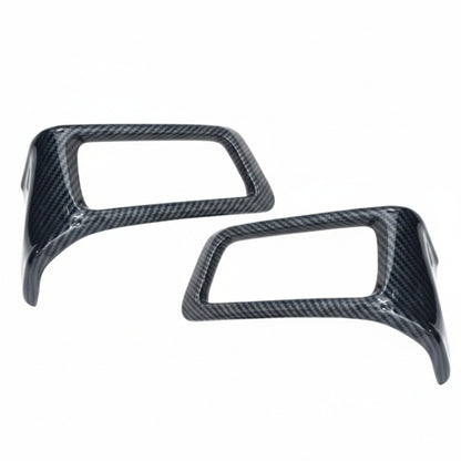 Two carbon fibre AC vents for Hycross on a white background
