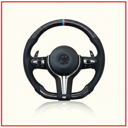 Black steering wheel with carbon fiber texture on a white background