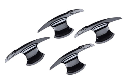 Set of 4 pcs of black catch cover for I20 Nios, shown on a plain white background.