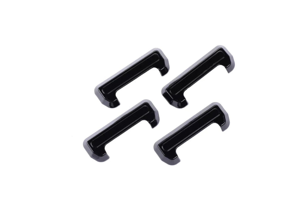 4 pcs of Black door handle covers for Bolero on a clear white background. 