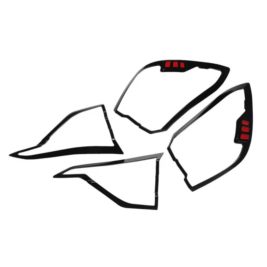 Set of 4 black taillight covers for Magnite, displayed on a white background. 
