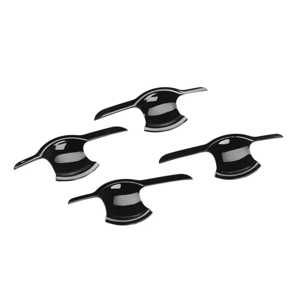 Set of 4 black catch covers for Magnite, displayed on a white background. 