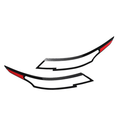 Set of 2 black headlight cover for Seltos, displayed on a white background. 