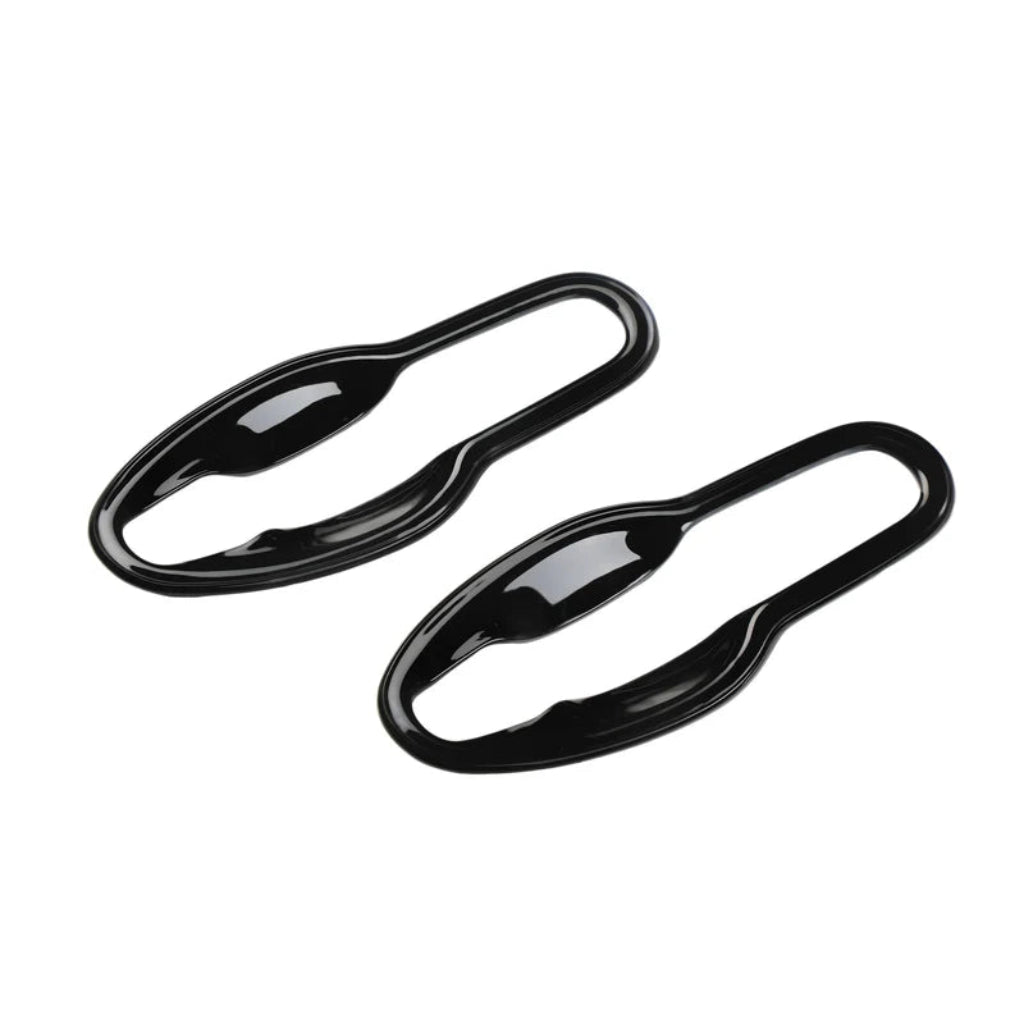 Black catch covers for swift placed on a white background. 