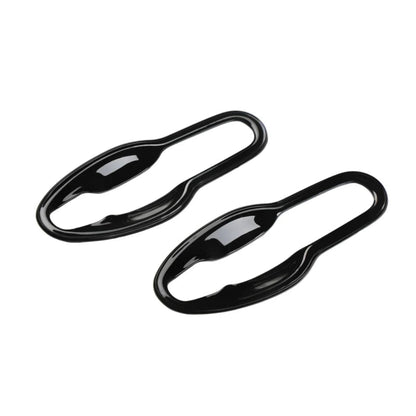 Black catch covers for swift placed on a white background. 