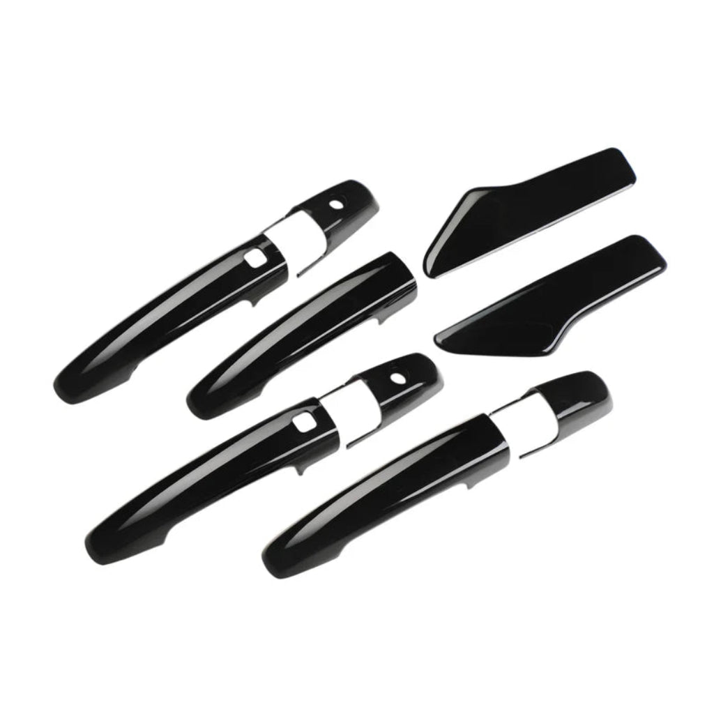 Black door handle covers for swift placed on a white background. 