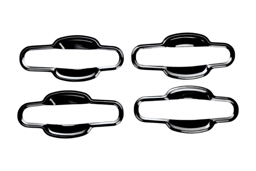 Set of 4 pcs black catch covers for Brezza, displayed on a white background. 