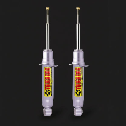 Two shock absorbers with a brand logo on a black background