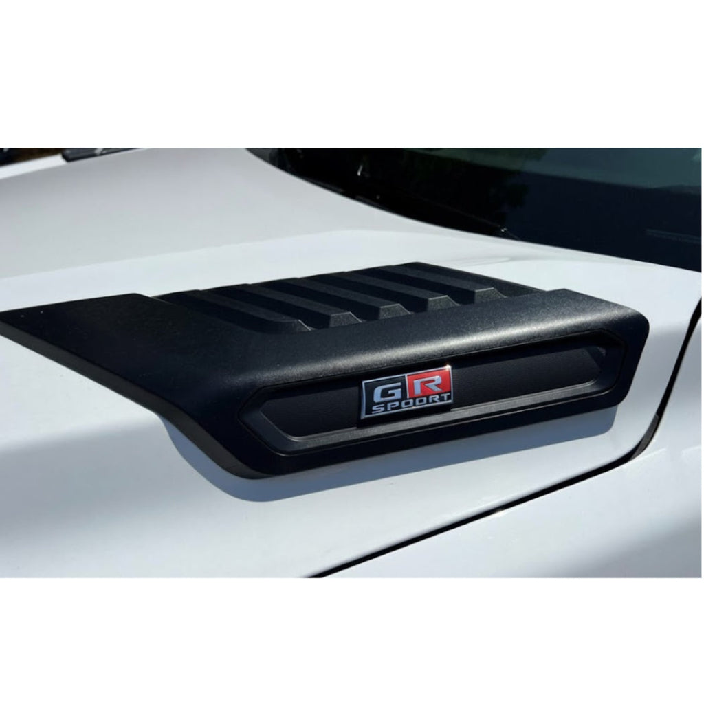 Black car spoiler with 'GR Sport' logo on a white car background