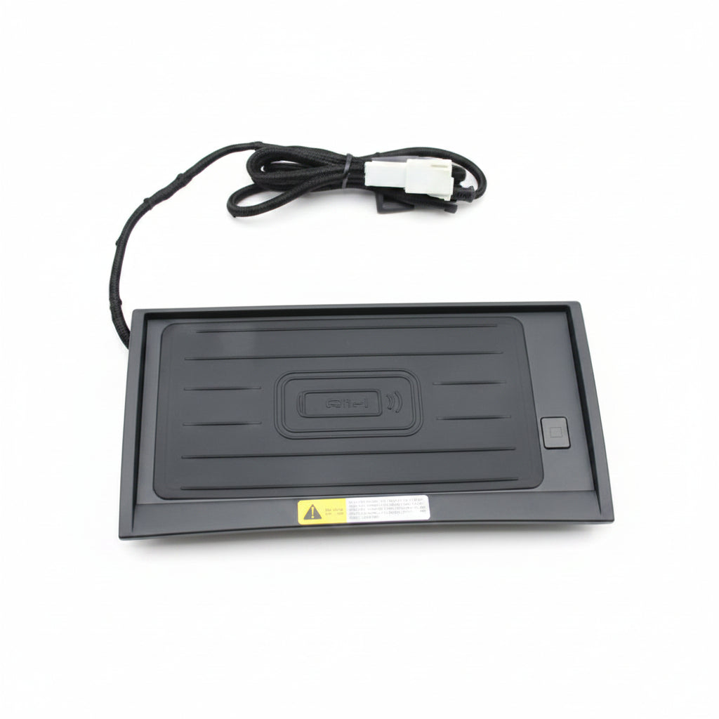 Black electronic device with a power cable on a white background