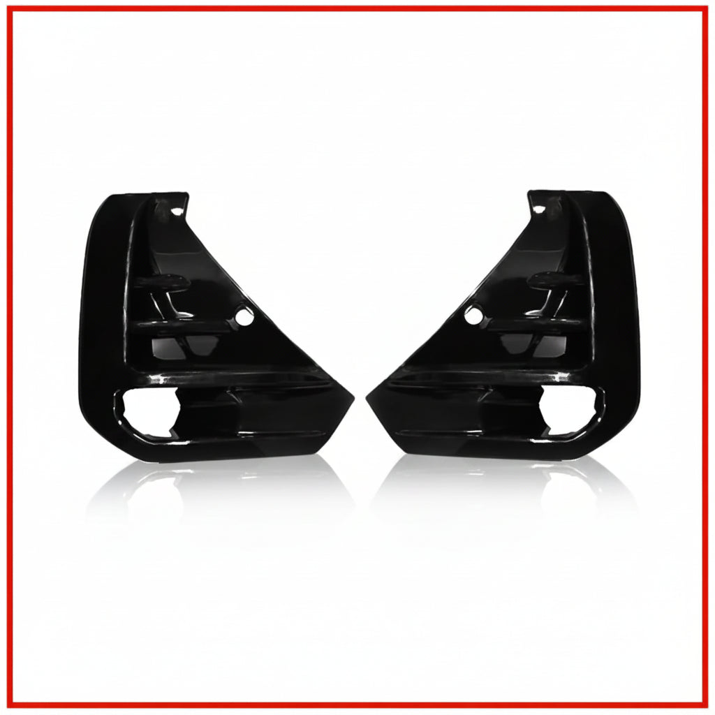 Two black car fog lamps housing on a white background