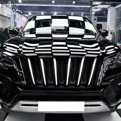 Black SUV with a checkered pattern on a showroom floor