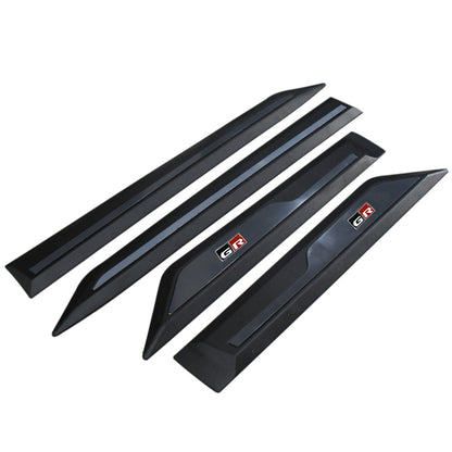 Set of black car side cladding with 'GR' logo on a white background
