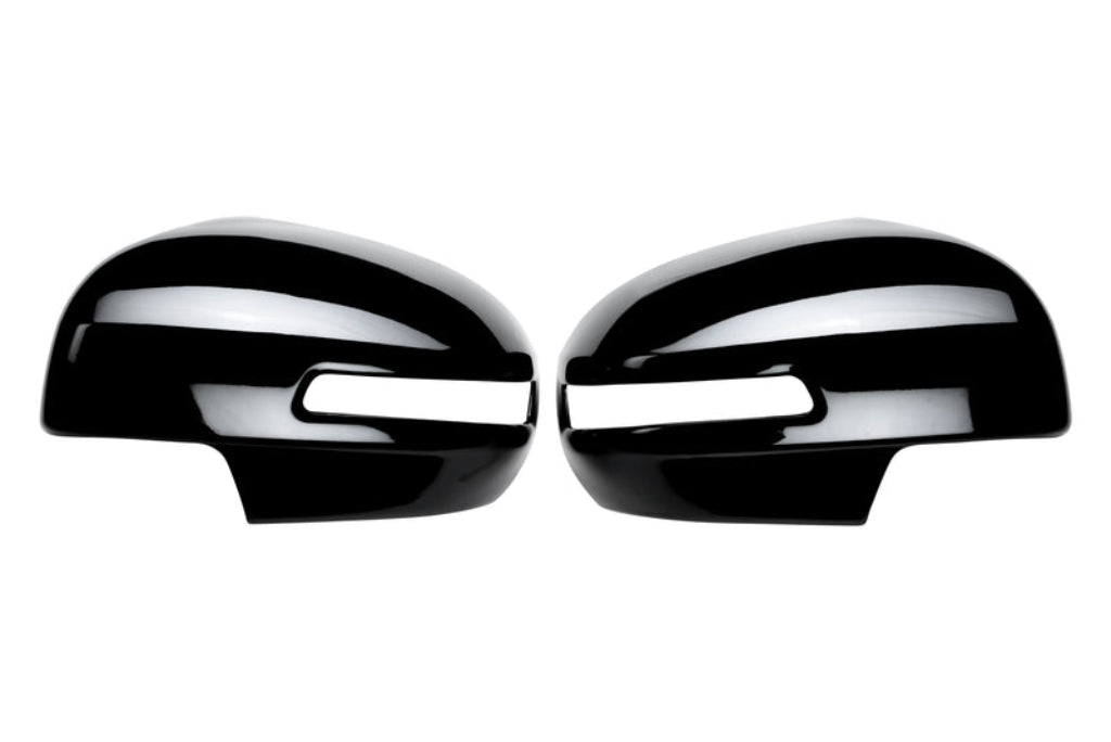 Set of 2 pcs black ORVM Covers for Brezza, displayed on a white background. 