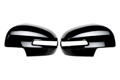 Set of 2 pcs black ORVM Covers for Brezza, displayed on a white background. 