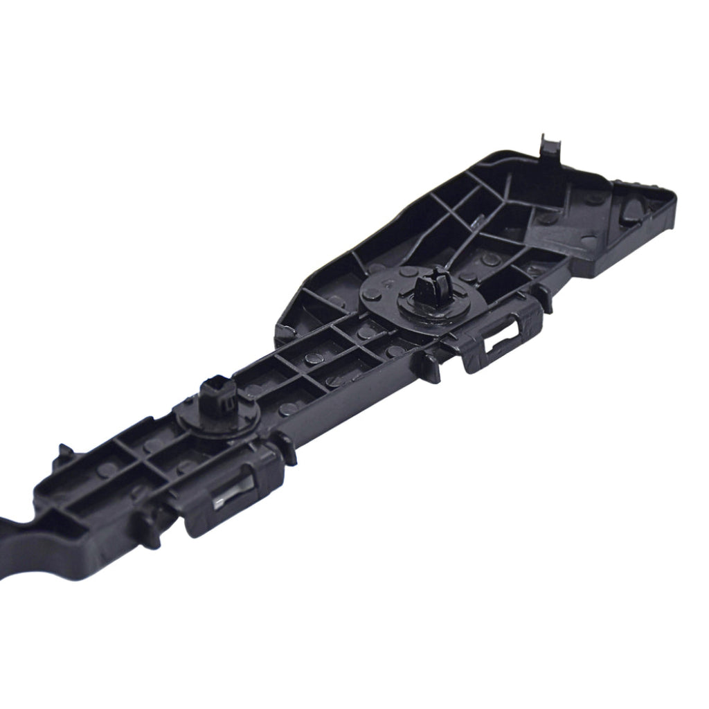 Black plastic component on a white background