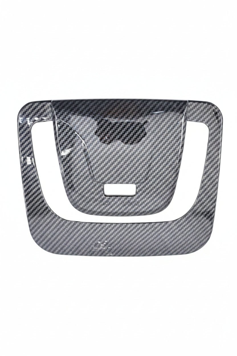 Carbon fiber patterned car dashboard cover on a white background