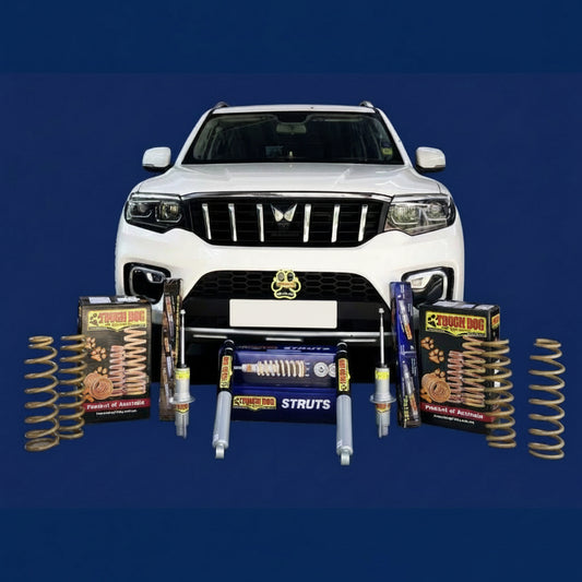 White SUV with automotive parts and components displayed in front on a blue background