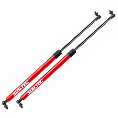 Two red shock absorbers with black ends on a white background, branded 'SUS.TEC'.