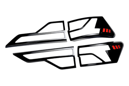 Set of black taillight covers for Brezza, displayed on a white background. 