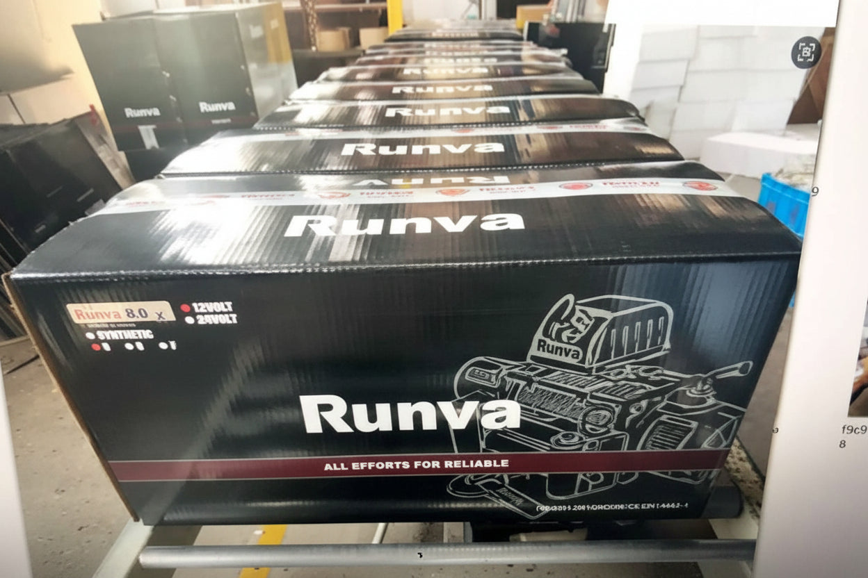 Row of Runva branded boxes on a conveyor belt