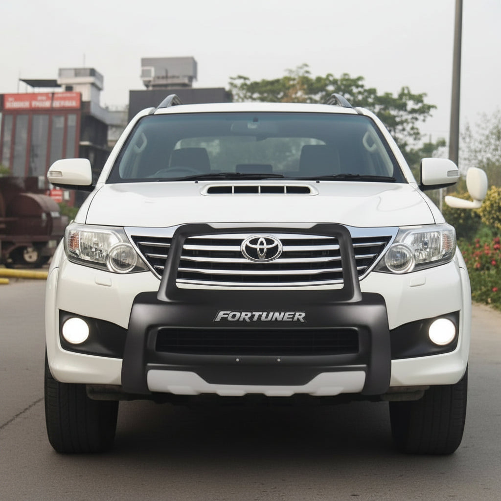 Photo of a Fortuner with front diffuser on road