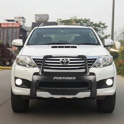 Photo of a Fortuner with front diffuser on road