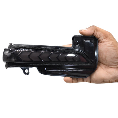 DRL for fortuner in hands on a white background