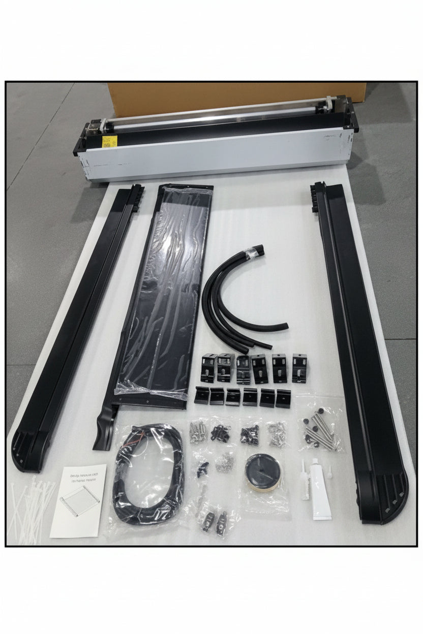 Set of mechanical parts and tools on a white surface with a gray floor background