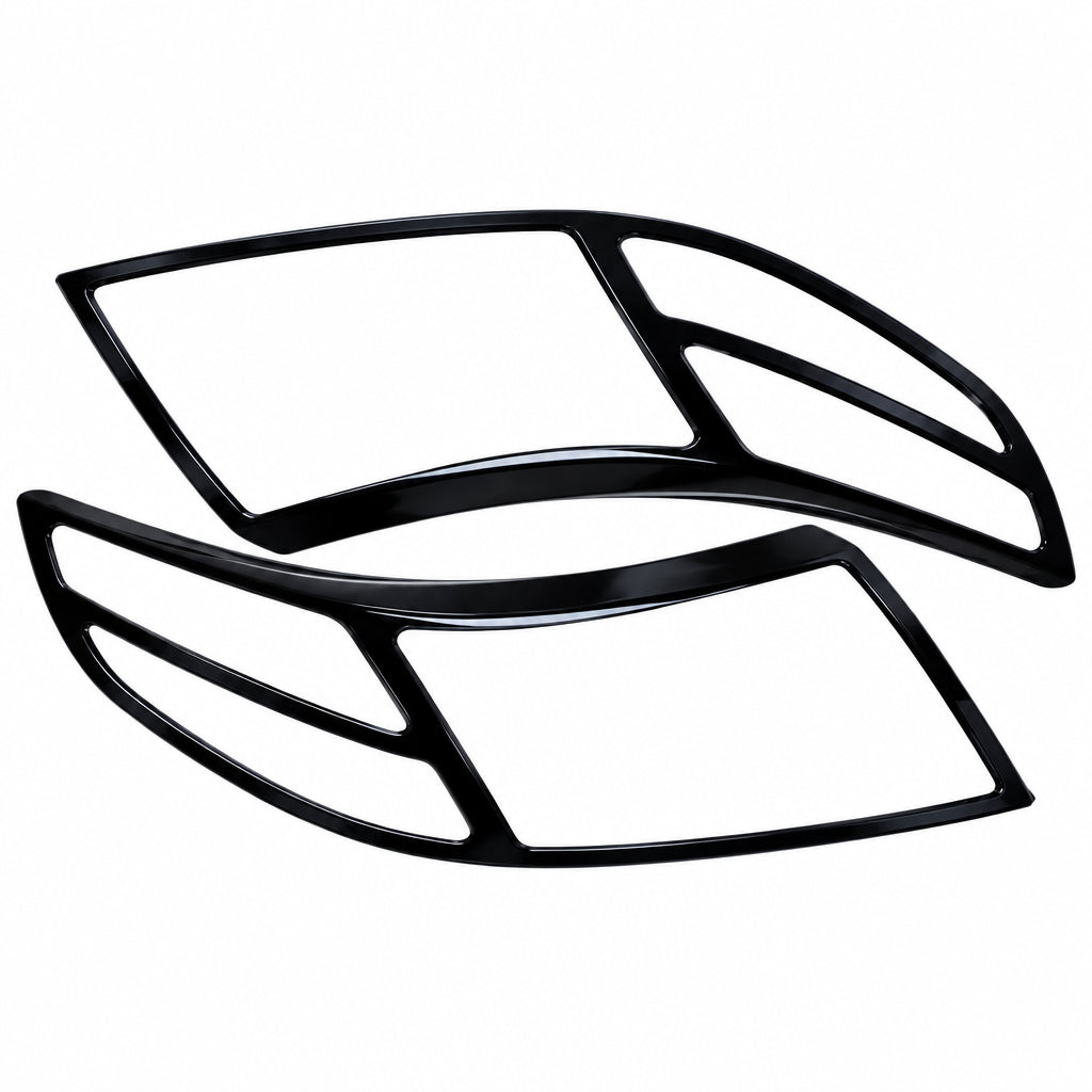 Pair of Black Headlight cover for Bolero Neo on a clear white background. 