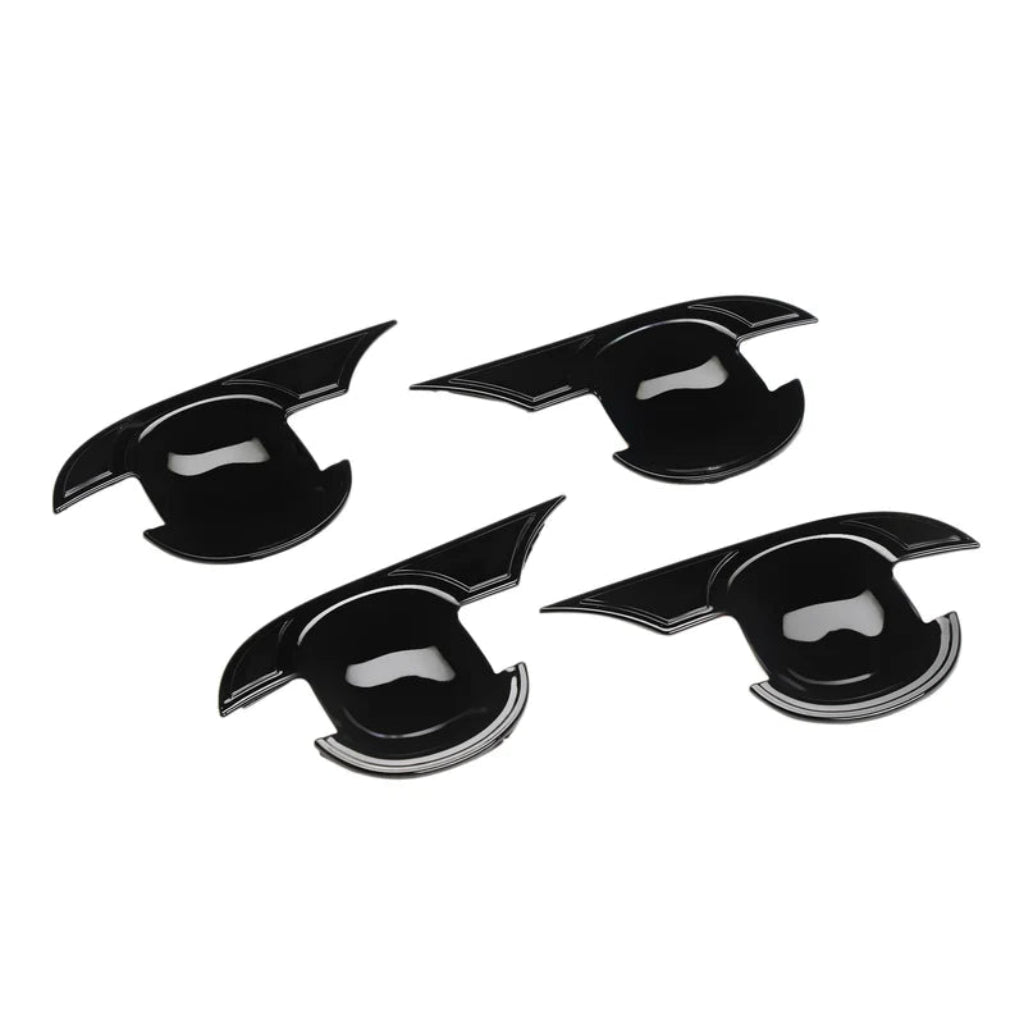 Set of 4 Black catch covers for Baleno, displayed on a white background.