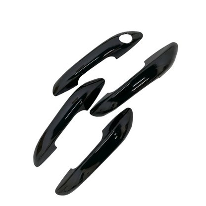 Set of 4 pcs black door handle covers for i10 Grand Nios, displayed on a white background. 