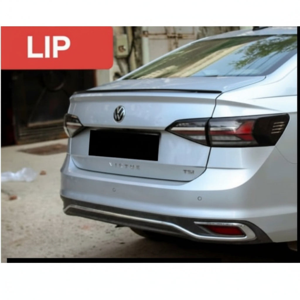 Car rear bumper with visible Volkswagen logo on a blurred background