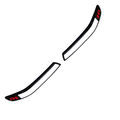 Set of 2 headlight covers for Fronx, displayed on a white background. 