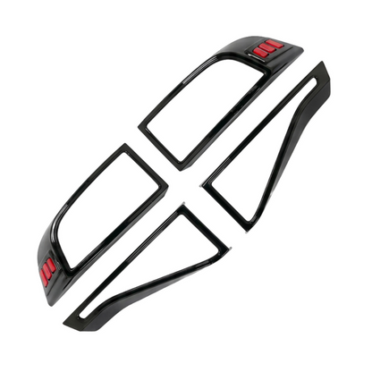 Set of black taillight covers for Fronx, displayed on a white background. 
